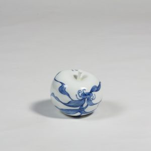 Waratah porcelain apple by Diana Williams