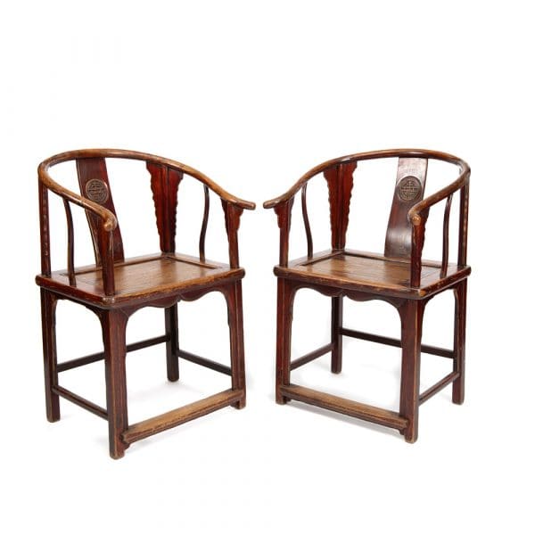 Horseshoe back armchairs